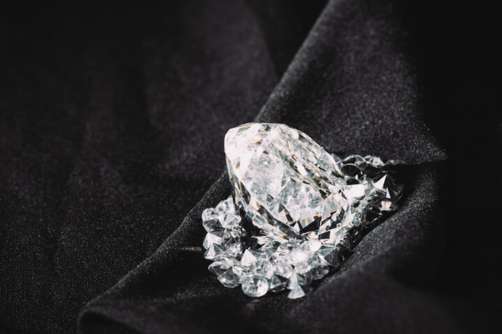 Diamond Company Names: A beautiful diamond rests on a cloth