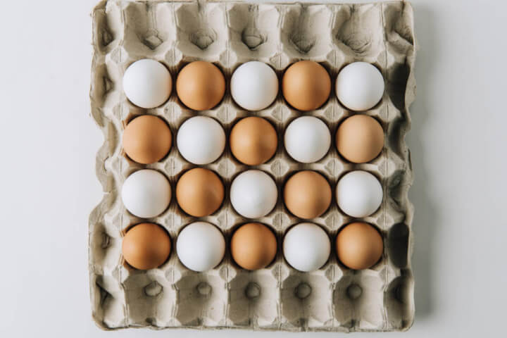 Egg Business Names: a crate full of eggs